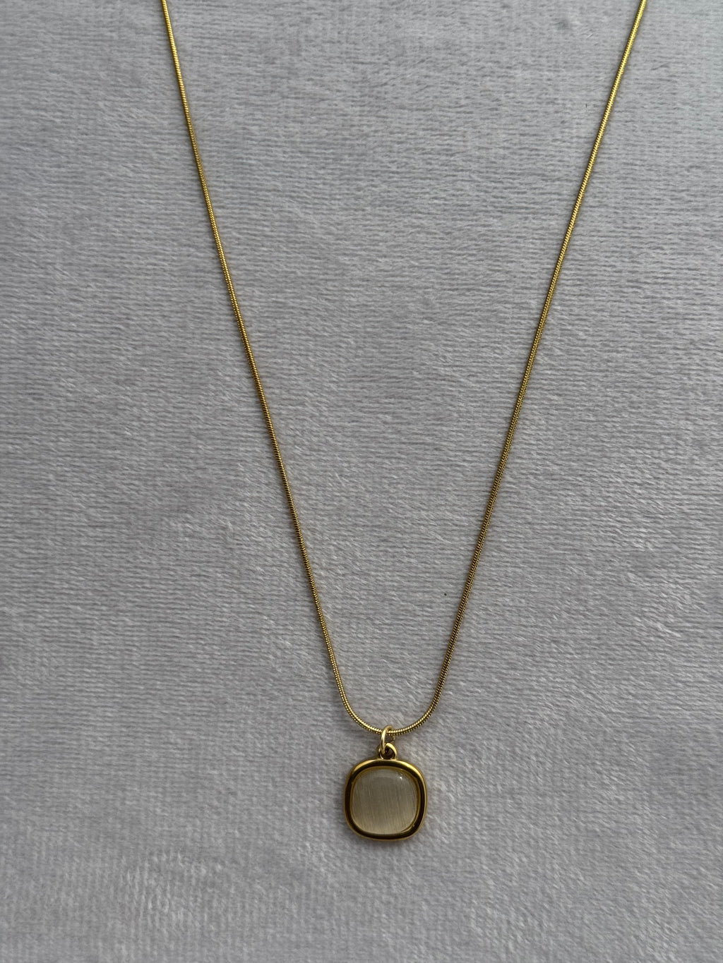 White-stone pendant