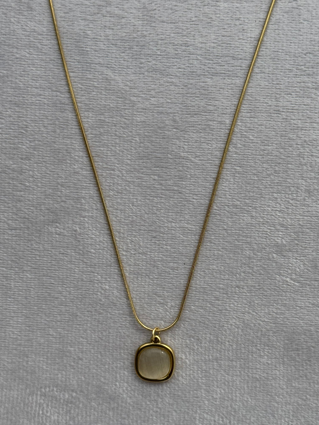 White-stone pendant
